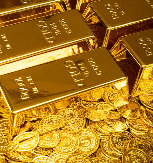 Bars of gold surrounded by coins to represent the rising price of gold and its economic impact | Generate