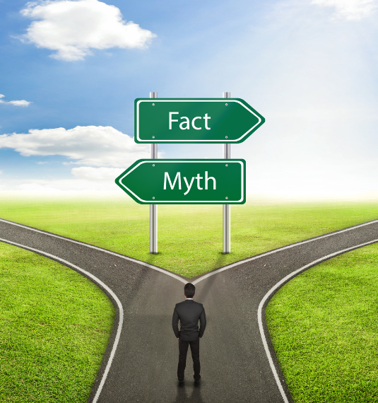 A man standing at a crossroads with one sign pointing to myths and the other to facts to represent common KiwiSaver myths | Generate