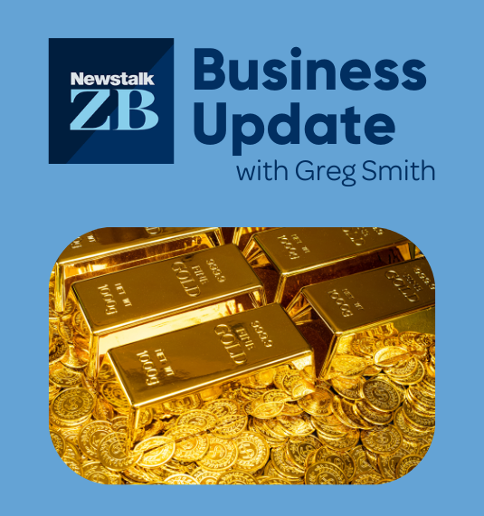 Bars of gold on top of a pile of coins to represent the rising price of gold now at at an all-time high. | Generate