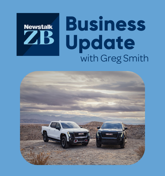 Two of General Motors' newest trucks parked in the desert to represent GM's latest earnings, Boeing and a trade deal between India and Europe