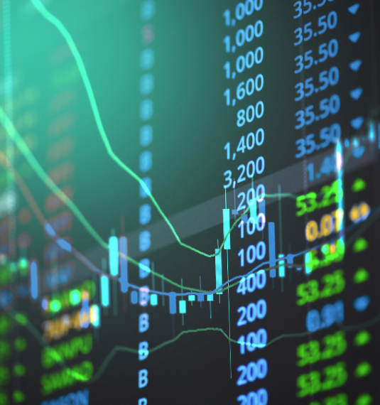 Stock market prices on a computer screen in blue and green to represent Generate's strong long-term performance of its KiwiSaver funds in the Morningstar Survey to December 31 2025