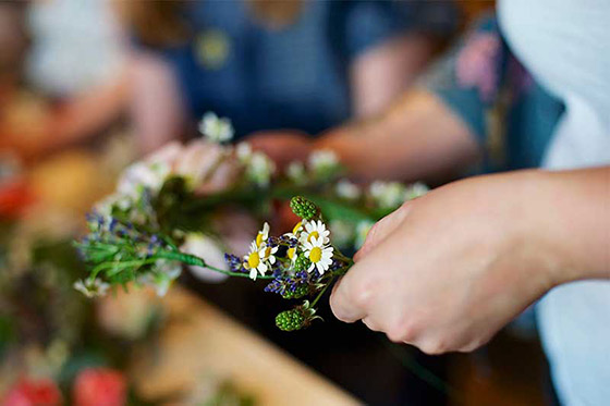 holding daisies.jpg