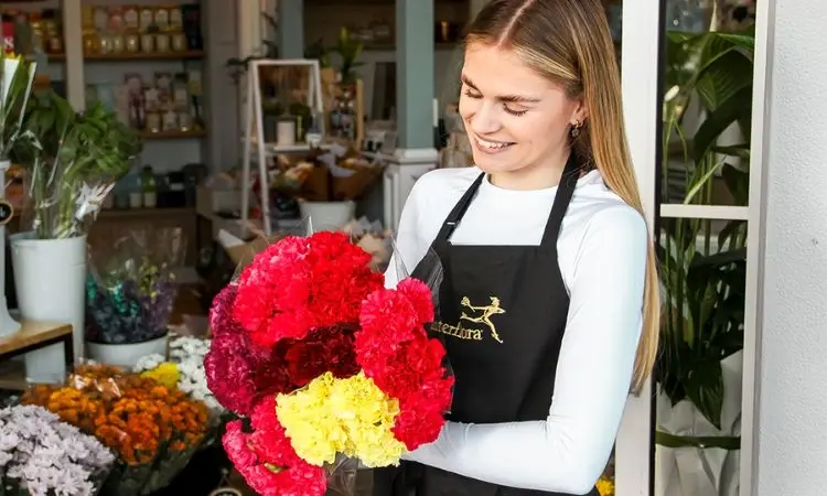 florist holding flowers